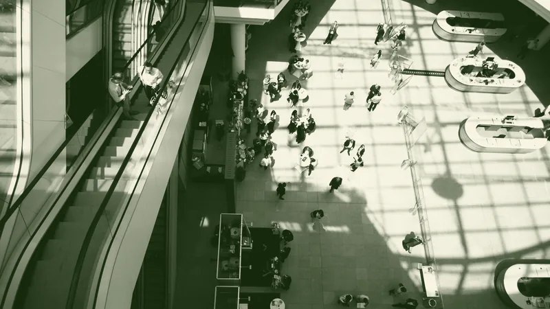 Escalators crossing inside a modern shopping mall atrium
