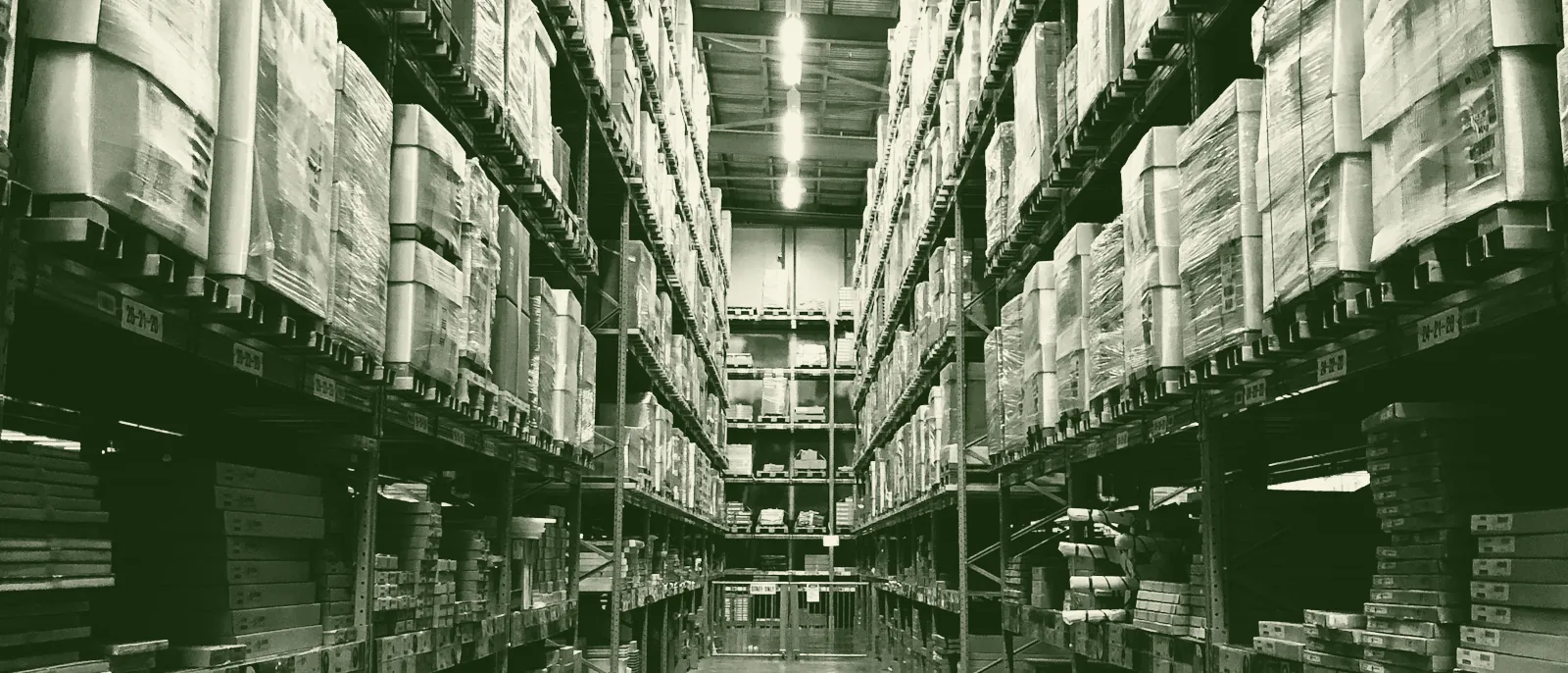 Tall storage racks lining a fulfillment-center aisle